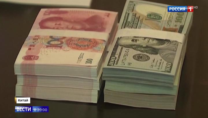 Пекин понизил курс юаня, чтобы выдержать конкуренцию с США