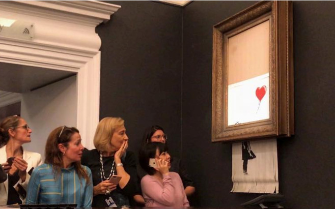 Картина Бэнкси самоуничтожилась на аукционе